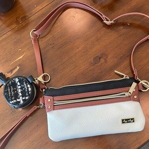 Itzy Ritzy crossbody bag and pacifier holder!